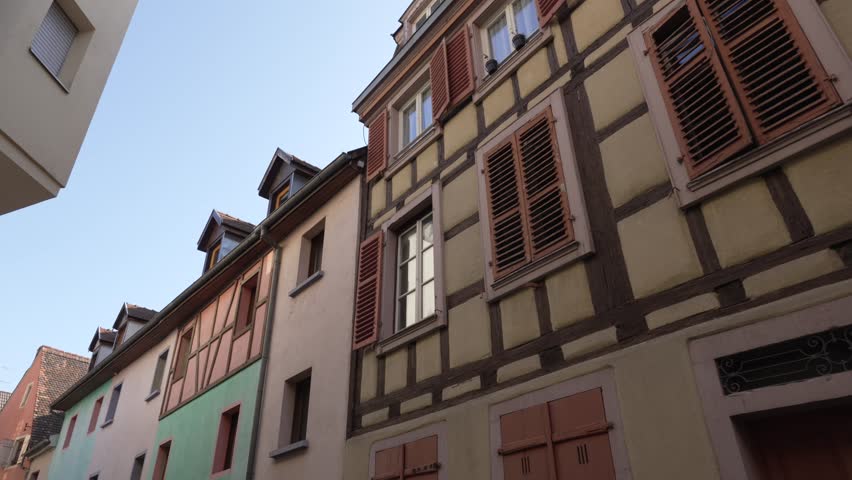 Colourful half-timbered row houses is historic medieval town of Colmar, France.