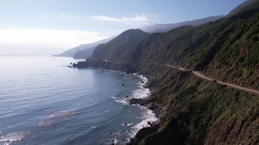 Aerial drone shot flying up Highway 1 on the Pacific Coast near Big Sur, California