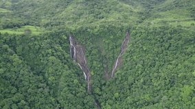 Hidden waterfall in the depths of dense green forest, Costa Rica - 4K video