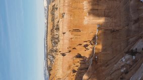 Bryce Canyon Hoodoos at Sunset in Winter. Snow. Bryce Canyon National Park. Utah, USA. Motion Panning Day to Night Time Lapse. Vertical Video - Powered by Shutterstock - Get 15% off with code: PIKWIZARD15