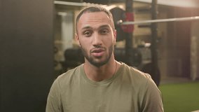 Sport channel video blog fitness vlog stream Latino American man guy athlete sportive fit instructor blogger vlogger influencer in gym talking at camera online workout training exercise tutorial chat - Powered by Shutterstock - Get 15% off with code: PIKWIZARD15