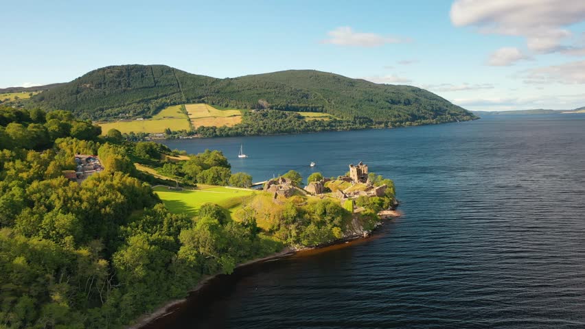 Sovereign of the Loch: Urquhart Castle on Loch Ness Amidst Scotland’s Vast Highland Landscape
