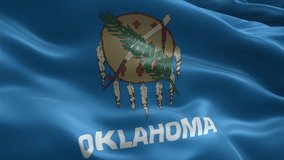 Oklahoma flag video waving in wind. Realistic flag background. Close up view, perfect loop, 4K footage