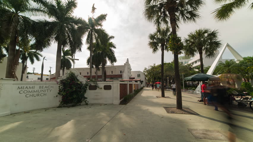 Timelapse Lockdown Of A Busy Sidewalk With Pedestrians Near A Community Church - Miami, Florida