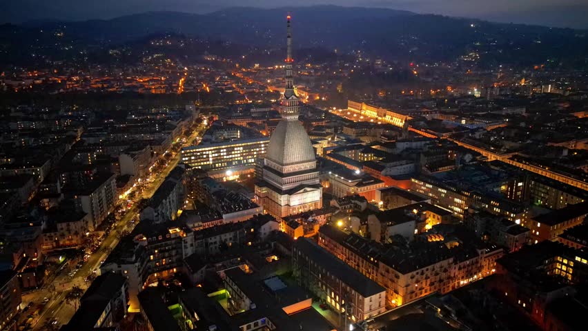 Turin, Italy. Time-lapse flight over the city. Mole Antonelliana - a 19th-century building with a 121 m high dome and a spire, Aerial View Royalty-Free Stock Footage #3400840777
