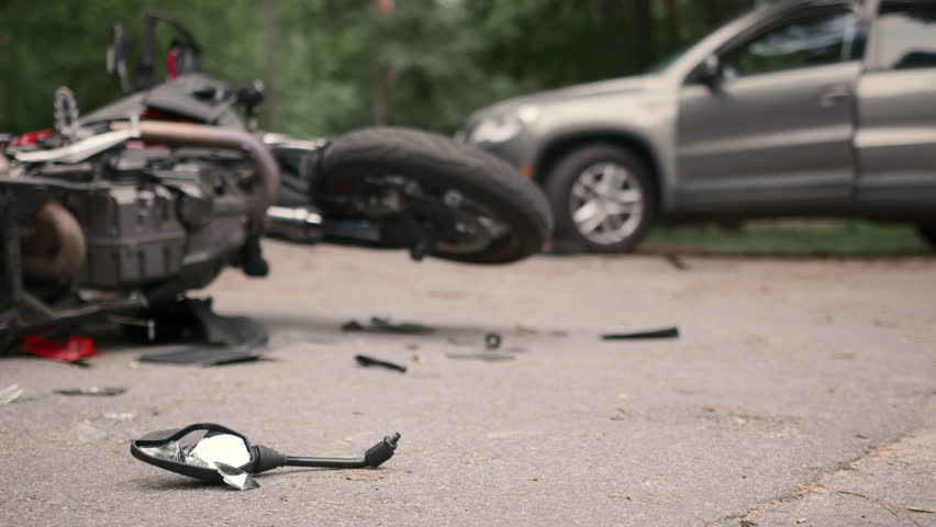 Damaged motorbike and car after accident Royalty-Free Stock Footage #3400906235