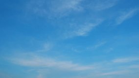 4K : Blue sky timelapse video reveals the ever-changing canvas of the sky. Wispy clouds dance across the brilliant blue expanse, painting a dynamic masterpiece in the heavens. Summer sky background.
 - Powered by Shutterstock - Get 15% off with code: PIKWIZARD15