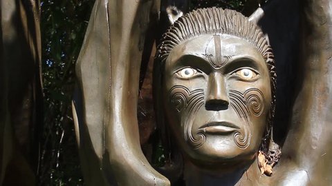 Beautifully carved wooden Maori statue in New Zealand