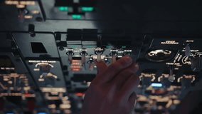 Hand of Airplane Pilot Using Control Panel in Plane Cockpit Close-Up. Aviator Using Technology in Aircraft Cabin to Flight Study. Ready Man Preparing to Fly Off Airport and Turning Switches Closeup 4k - Powered by Shutterstock - Get 15% off with code: PIKWIZARD15