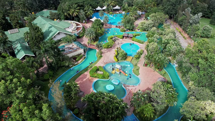 Aerial shot of a charming amusement park with a club and resort in lush greenery in Bangalore during the spring season