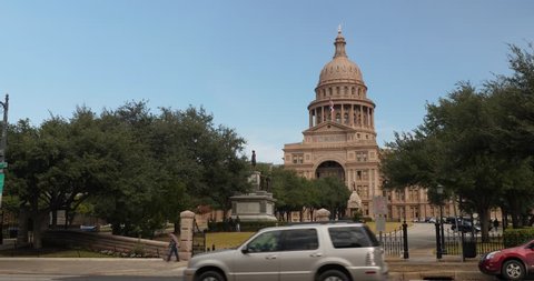 AUSTIN, TX - Circa December, 2017 - Traffic passes by the Texas state capitol in downtown Austin, Texas.  	