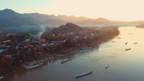 Drone aerial view of Luang Prabang, Laos, low level of Mekong river.