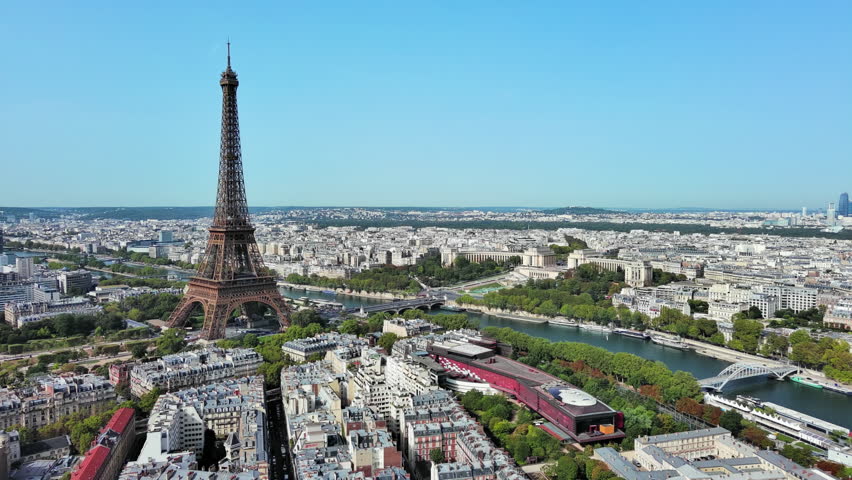 Aerial View of Paris, France: Iconic Landmark Eiffel Tower, Champ de Mars and Seine River, Clear Blue Sky Royalty-Free Stock Footage #3401293545