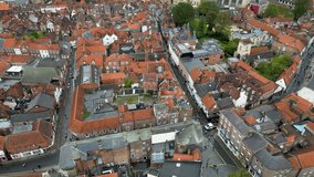 Aerial footage of the town of York located in North East England. The footage shows Cathedral in the main town centre. Cinematic aerial view