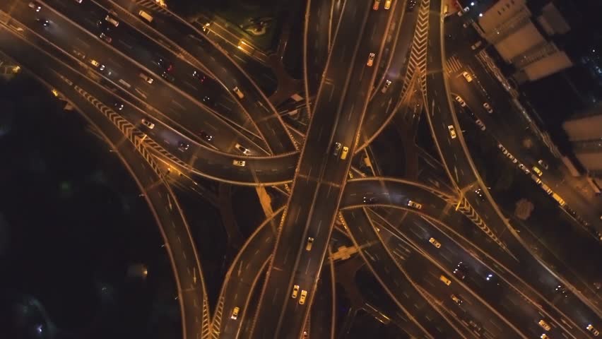 Yan'An Elevated Road Flyover at Night. Shanghai City. China. Aerial Vertical Top-Down View. Rotation. Vertical Video