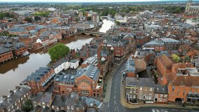 Aerial footage of the town of York located in North East England. The footage shows Cathedral in the main town centre. Cinematic aerial view