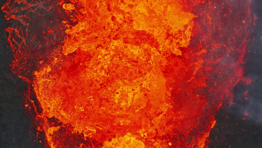 Close up view of active volcanic crater eruption. Hot lava and magma splashing out of crater. Tourist attraction in Iceland Litlihrutur eruption 2023. Beautiful and dangerous disaster. Royalty-Free Stock Footage #3401433133
