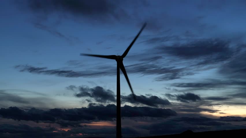 Wind Farm Turbines Generating Renewable Energy Through the Night