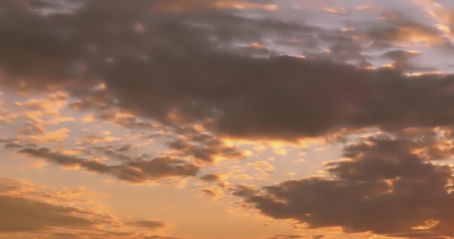 Time lapse sunset, natural golden colors with nice sky, fast motion clouds in horizon.