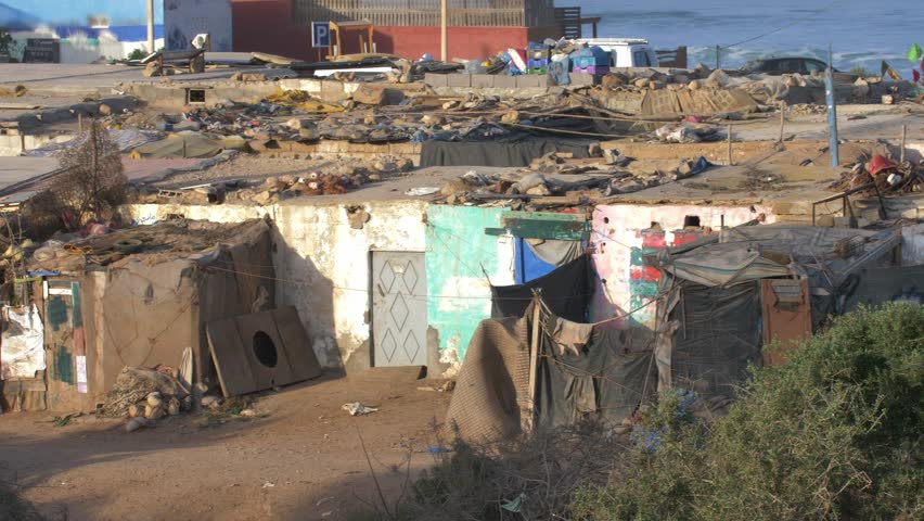 Poverty-Stricken Fishing Village Shanty Town Slum Buildings in Morocco Royalty-Free Stock Footage #3401773625
