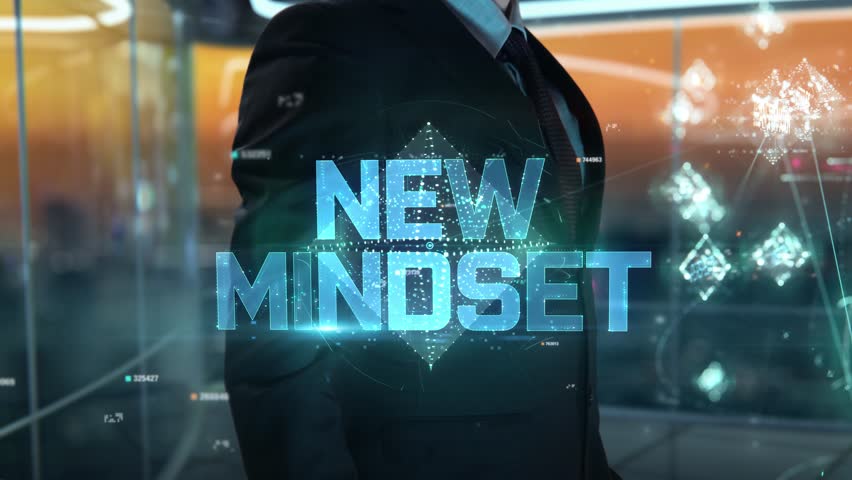 Businessman with New Mindset hologram concept
