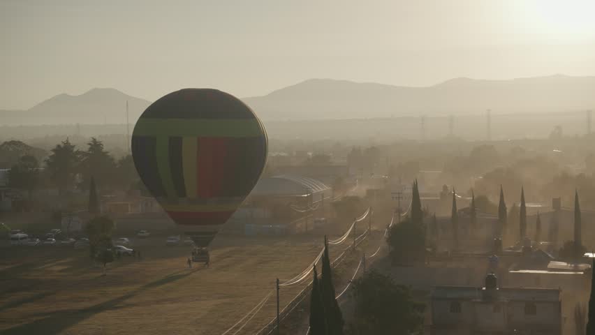 Hot Air Balloon Flying Above Pyramids of San Juan Teotihuacan Mexico Sunrise Ride