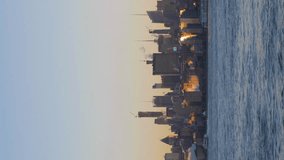 Manhattan Skyline and Hudson River in the Morning. New York City, United States of America. Wide Shot. Vertical Video - Powered by Shutterstock - Get 15% off with code: PIKWIZARD15