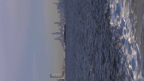 Manhattan and Jersey City Urban Cityscape in the Morning. New York City. View From the Boat, United States of America. Vertical Video