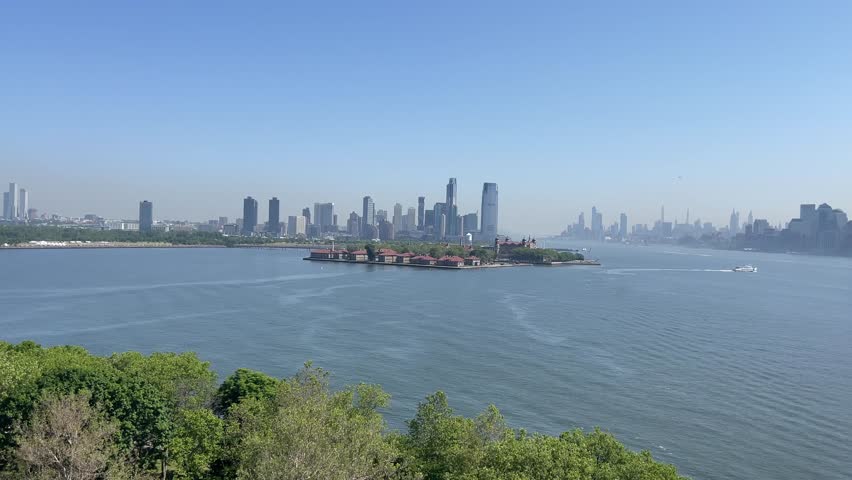 Ellis Island and the skyline of New York (USA), seen from Liberty Island, where the Statue of Liberty is located, a place known all over the world.
