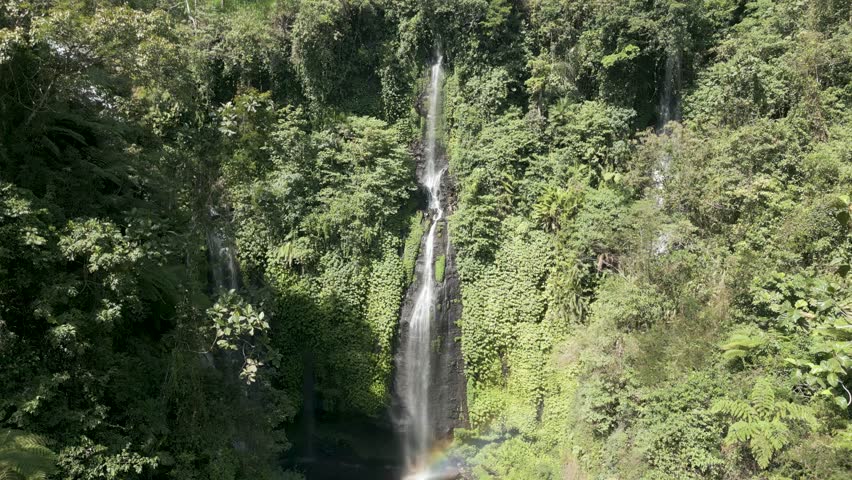 Rainbow at Fiji Waterfall (known as Triple Waterfall), Bali, Indonesia Royalty-Free Stock Footage #3401900411
