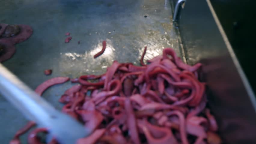 Traditional delicious Turkish street food; Izmir cesme kumru sandwich made of cheese, soudjouk, salami, soudjouk, tomato and pepper