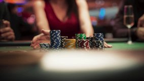 Anonymous Glamorous Woman in a Evening Dress Collecting her Prize of Poker Chips in a Luxury Casino. Lucky Female Winner Hitting the Jackpot, Happy and Rich. Slow motion - Powered by Shutterstock - Get 15% off with code: PIKWIZARD15