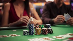 Poker Game in Casino: Betting All in Chips at the Poker Table. In the Blurred Background, Anonymous Players Revealing Their Cards and Winner. Glamorous Gambling Enthusiasts Enjoying Win. Slow Motion - Powered by Shutterstock - Get 15% off with code: PIKWIZARD15