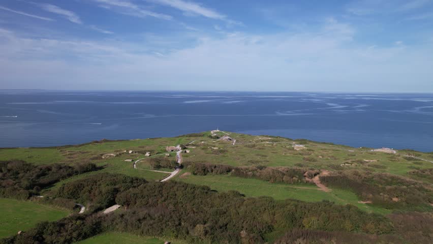 DRONE AERIAL FOOTAGE: The World War II Pointe du Hoc Ranger Monument. Pointe du Hoc is a high point between two of the five D-Day landing beaches, Utah and Omaha in Normandy, France.