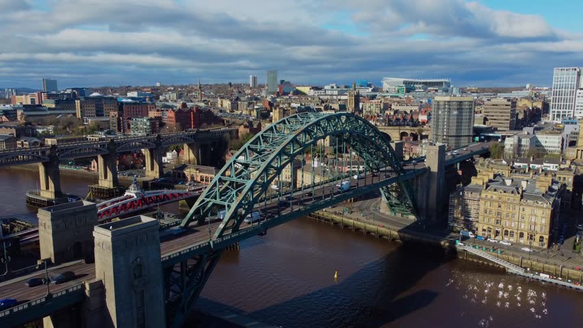Aerial drone video of Tyne Bridge and Swing Bridge on Newcastle Quayside and city in the background - Newcastle Upon Tyne, England Royalty-Free Stock Footage #3402082821