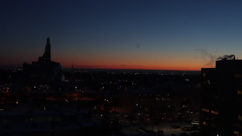 Winnipeg sunrise time lapse of museum of human rights and the forks winter 2020