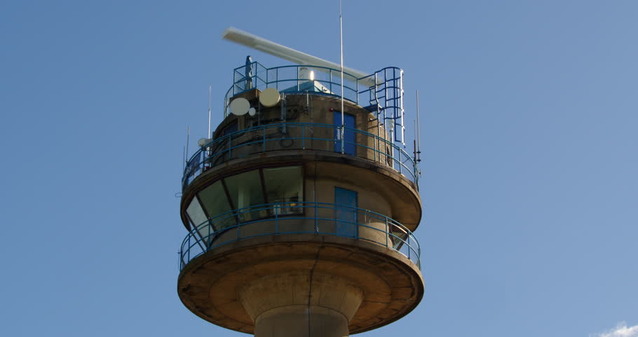 Looking up at National Coastwatch Institution, Calshot Tower Lookout Station at Calshot spit Royalty-Free Stock Footage #3402116667