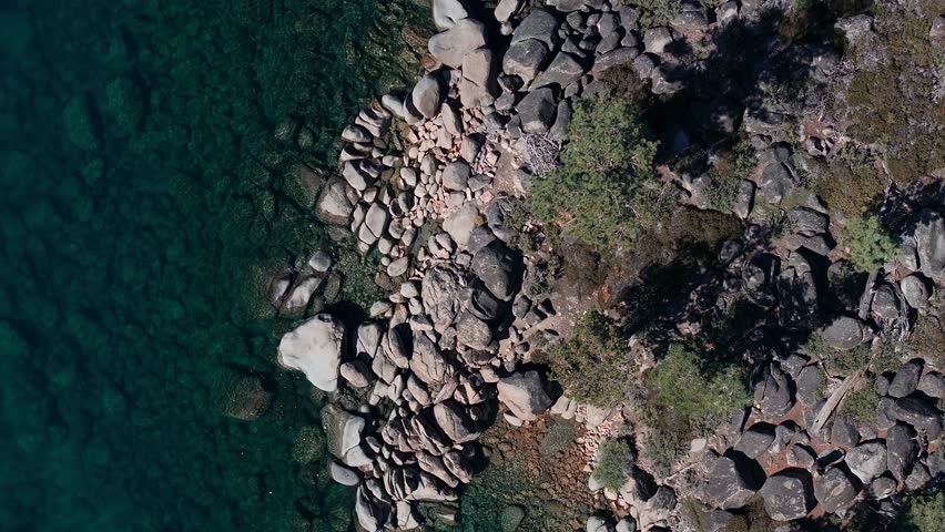 Beautiful aerial view of the Tahoe lake from above in California, USA. Wild forests, fresh air and mountains of California.