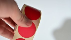 Opening barcode roll labels by hand. Opened thermal barcode roll.	 - Powered by Shutterstock - Get 15% off with code: PIKWIZARD15