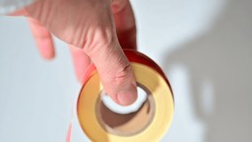 Opening barcode roll labels by hand. Opened thermal barcode roll.	 - Powered by Shutterstock - Get 15% off with code: PIKWIZARD15