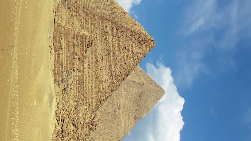 Timelapse with clouds over great pyramids at Giza Cairo in Egypt. Vertical video