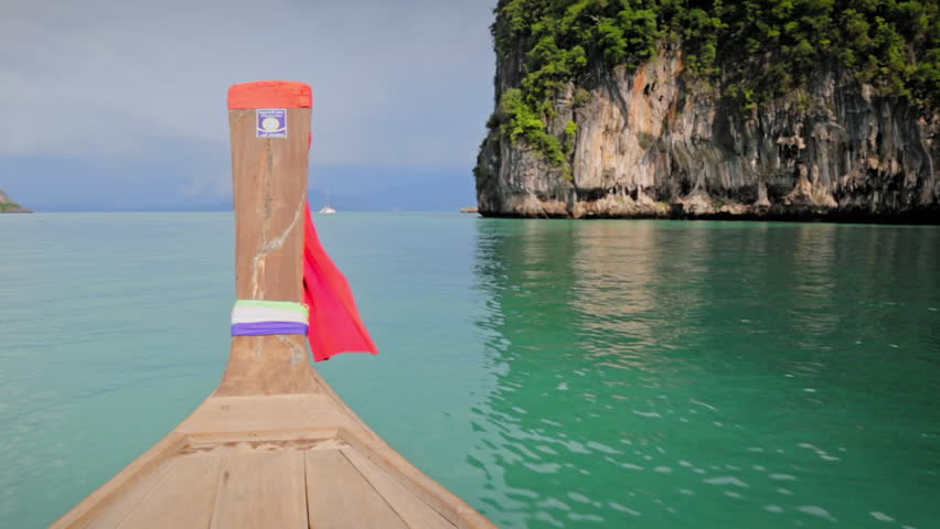 bow of longboat entering a lagoon at Hong Island, thailand