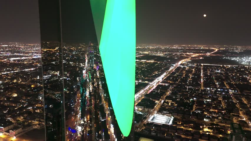 Drone shot flying. Saudi Arabia. Riyadh. Kingdom tower. Night. Royalty-Free Stock Footage #3402628325