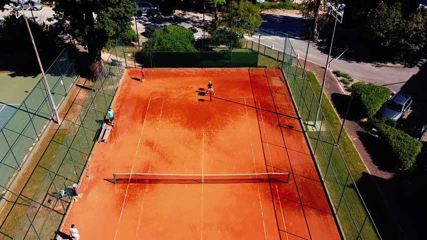 Augmented reality tennis match on tennis court, futuristic tennis sport concept, future concept digitalization with AI data sport analysis Royalty-Free Stock Footage #3402665351