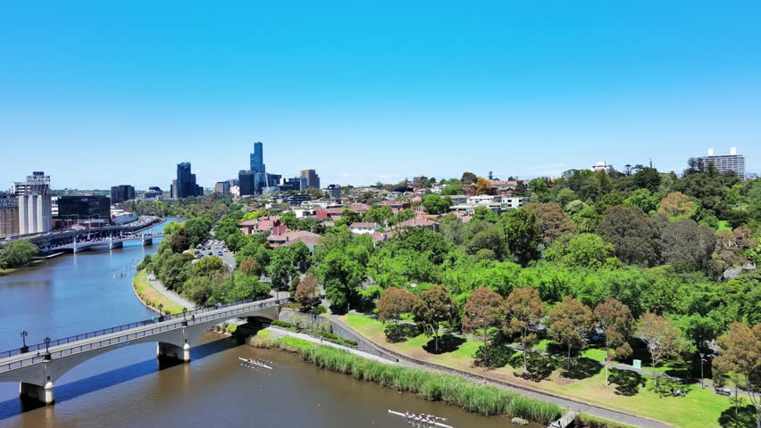 Melbourne, Australia: Aerial view of Royal Botanic Gardens Victoria in capital city of Victoria, sunny day with clear blue sky Royalty-Free Stock Footage #3402891427