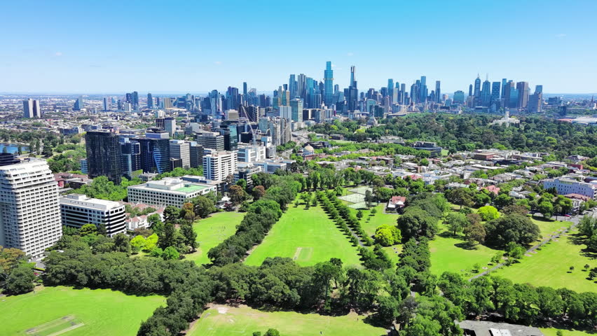 Melbourne, Australia: Aerial view of skyscraper skyline of Melbourne central business district (CBD) in capital city of Victoria, taken from Fawkner Park on sunny day with clear blue sky