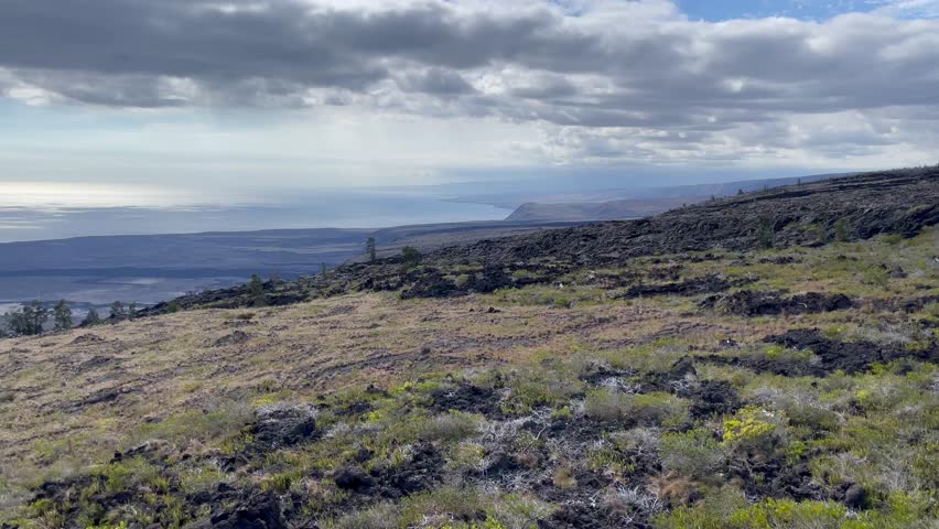 Scenic aerial panoramic volcanic coast vista at the Volcanoes National Park on the Big Island of Hawaii