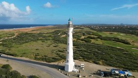 California Lighthouse, Aruba. Aruba's famous lighthouse. Important tourism spot in the north of the island. Beautiful sunny day in the Caribbean. Drone video Top View.
