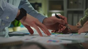 Colleagues intensively discuss digital data. The camera follows the movement of management consultants working on diagrams to create new company development strategies - Powered by Shutterstock - Get 15% off with code: PIKWIZARD15