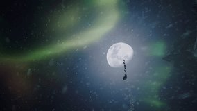 Santa flying in his sleigh with his reindeer against the background of the moon. Santa's flight above the clouds. Concept for the theme of the New Year. Santa delivers gifts. Vertical video - Powered by Shutterstock - Get 15% off with code: PIKWIZARD15